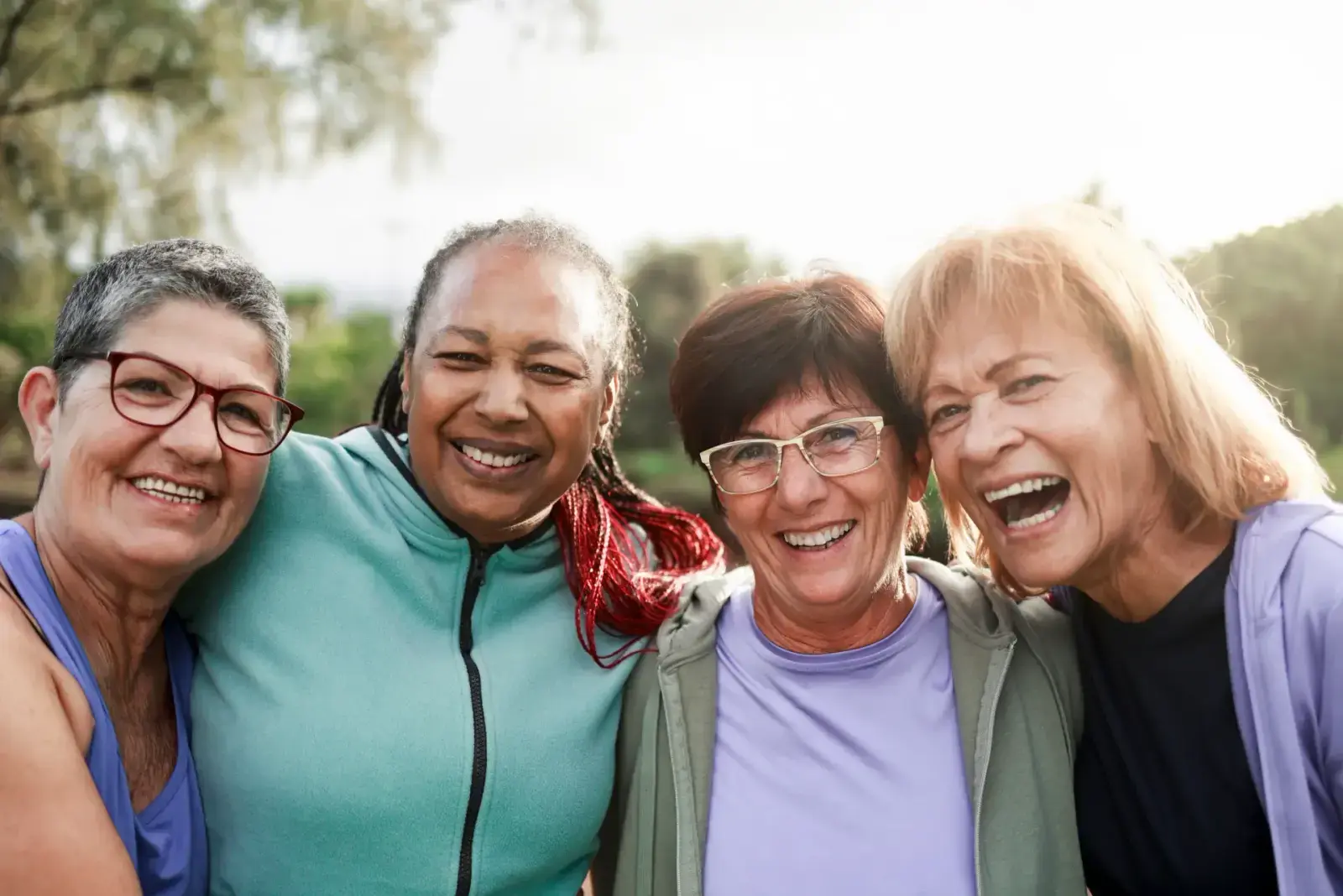 Smiling patients at Smiles Unlimited Family Dental